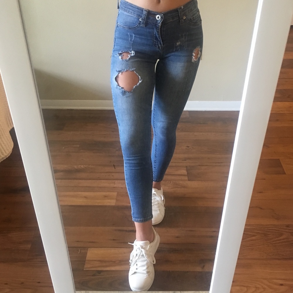 Distressed mid rise jeans